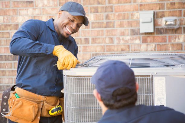 https://www.istockphoto.com/photo/multi-ethnic-team-of-blue-collar-air-conditioner-repairmen-at-work-gm944678614-258049679?utm_source=pexels&utm_medium=affiliate&utm_campaign=sponsored_photo&utm_content=srp_inline_media&utm_term=air%20conditioner%20technician