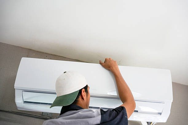 https://www.istockphoto.com/photo/technician-installing-indoor-air-conditioner-unit-hvac-professional-servicing-wall-gm2220355404-636787983?utm_source=pexels&utm_medium=affiliate&utm_campaign=sponsored_photo&utm_content=srp_inline_media&utm_term=aircon%20technician%20working%20split%20type